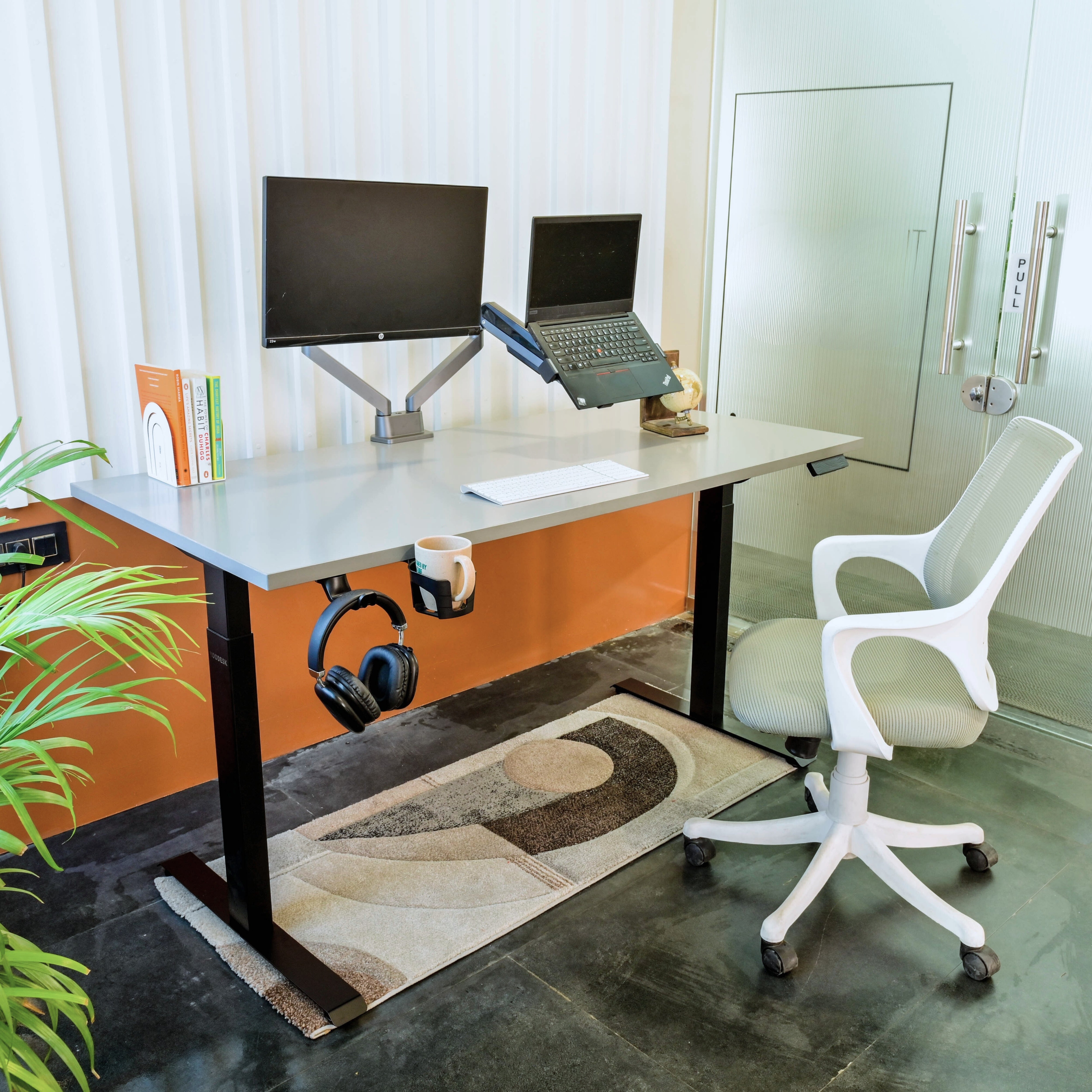 Pro Series height adjustable desk frame in a modern office setup