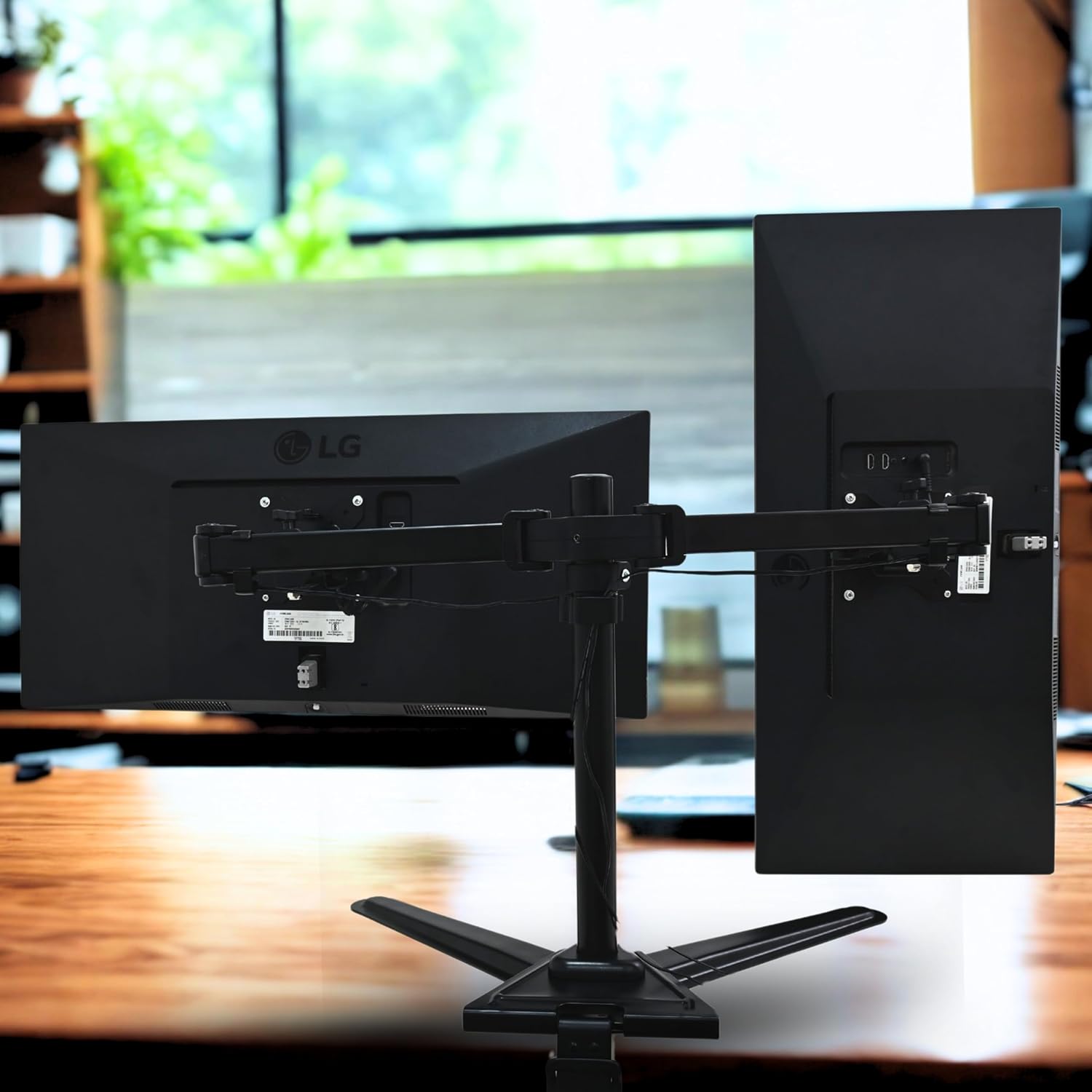 T200 Dual Monitor Stand for 13''-32'' Screens with two monitors on a desk in an office setting